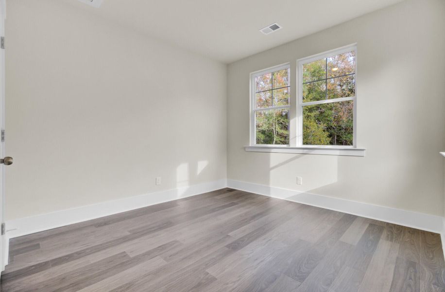 Spacious, unfurnished interior of a new home in Indigo Grove Single Family Homes, Johns Island (Image 38).