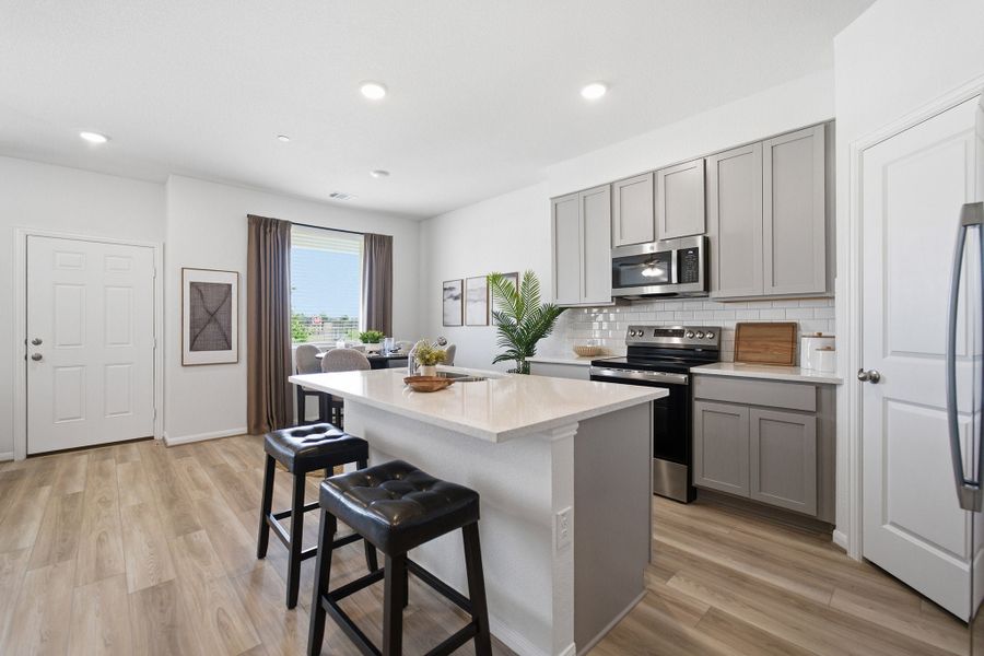 Representative furnished interior of a home built from the Mies by CastleRock Communities in Municipal Drive Townhomes, Leander (Image 12). Representative furnished interior of a home built from the Mies by CastleRock Communities in Municipal Drive Townhomes, Leander (Image 12).