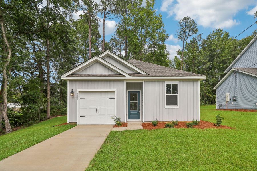 Front exterior of a new home in Founder's Park, Lincolnville, SC, highlighting curb appeal (Image 20). Front exterior of a new home in Founder's Park, Lincolnville, SC, highlighting curb appeal (Image 20).