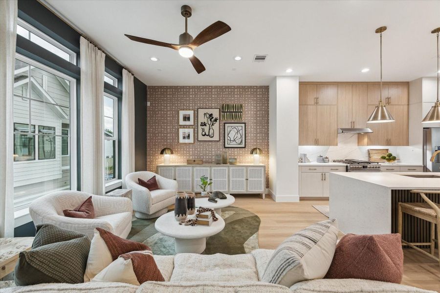 Expansive living room connected to gourmet kitchen Expansive living room connected to gourmet kitchen