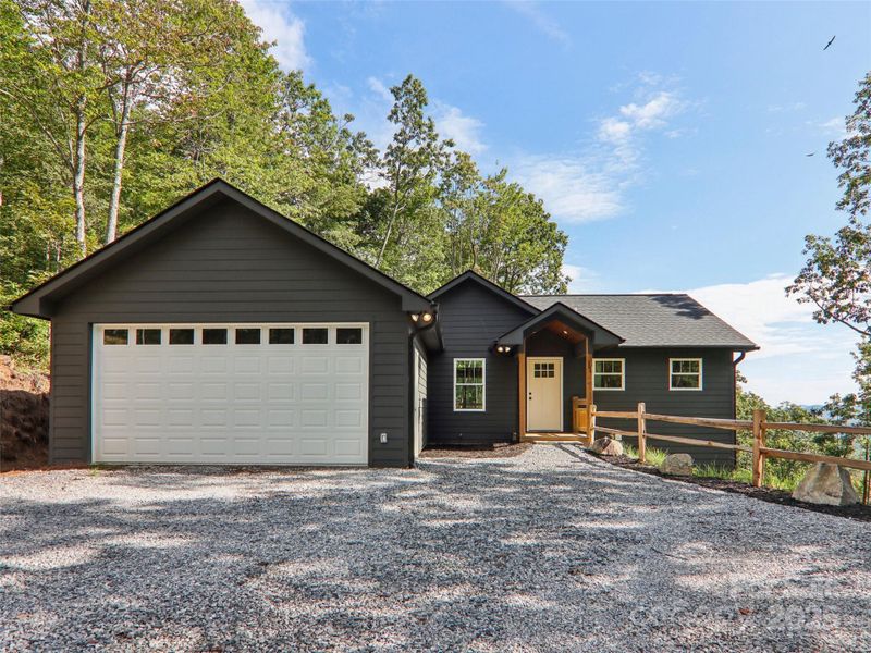 Front exterior of a new home in , Brevard, NC, highlighting curb appeal (Image 1). Front exterior of a new home in , Brevard, NC, highlighting curb appeal (Image 1).