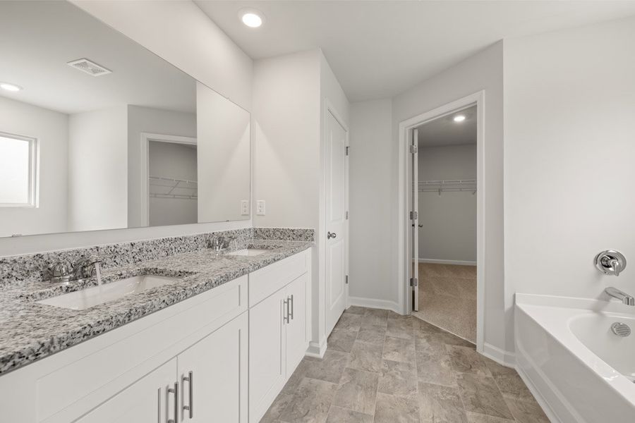 Representative furnished interior of a home built from the Mansfield by D.R. Horton in Southwind Village, Evans (Image 10).