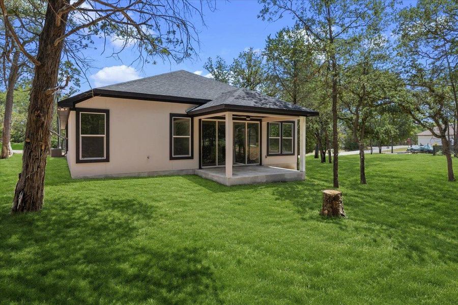 Exterior details and patio area of a home in , Bastrop (Image 3).
