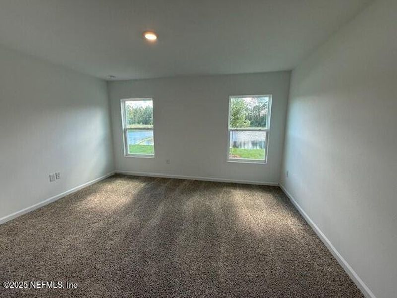 Spacious, unfurnished interior of a new home in Grand Reserve, Bunnell (Image 23).