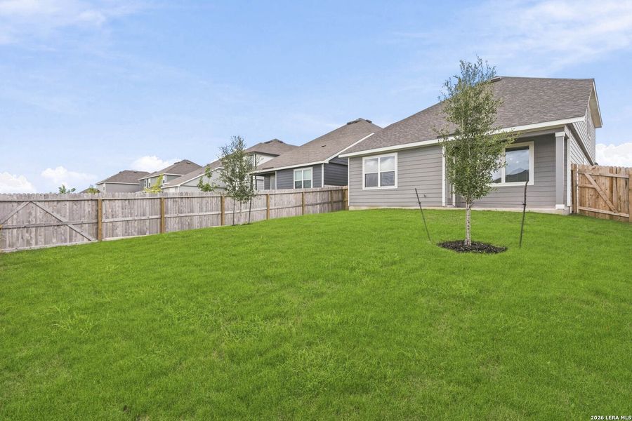 Exterior details and patio area of a home in Abbott Place, St. Hedwig (Image 19).