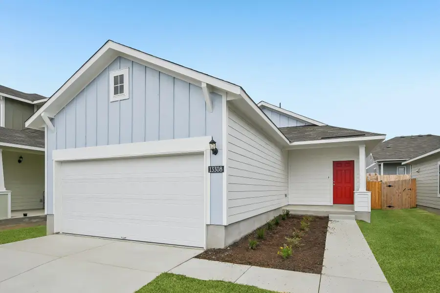 Front exterior of a new home in Edgebrooke, Pflugerville, TX, highlighting curb appeal (Image 17).