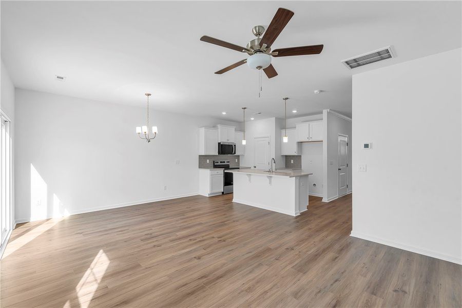 Bright and airy open concept living with elegant h Bright and airy open concept living with elegant h