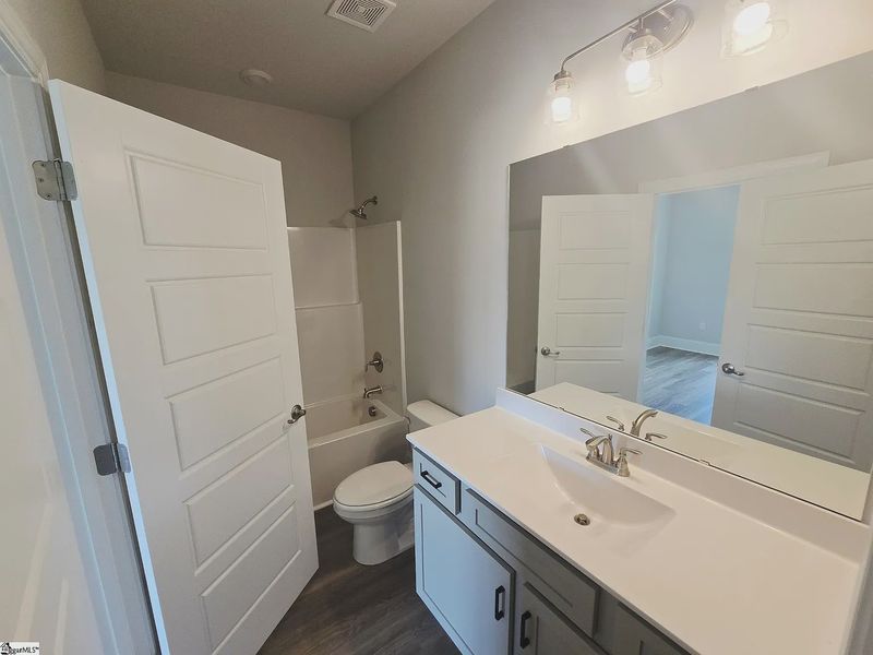 Furnished interior view inside a new home in Hidden Lake Estates, Greenville (Image 6).