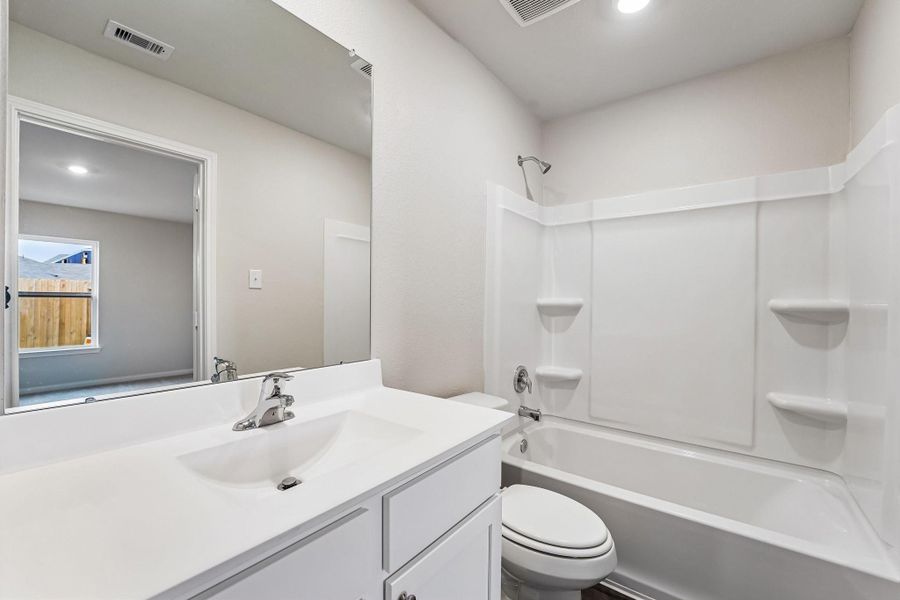Primary Bathroom comes with a shower and tub combo.