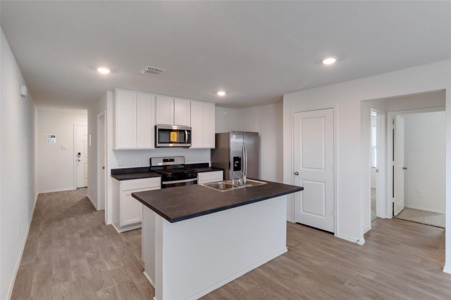Furnished interior view inside a new home in Watermill, Uhland (Image 4).