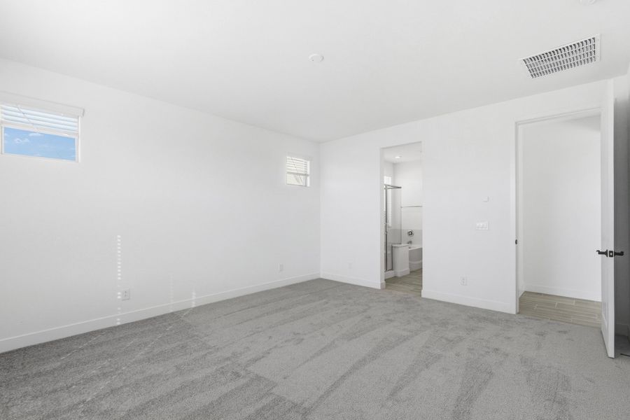 Spacious, unfurnished interior of a new home in Artisan at Asante, Surprise (Image 24).