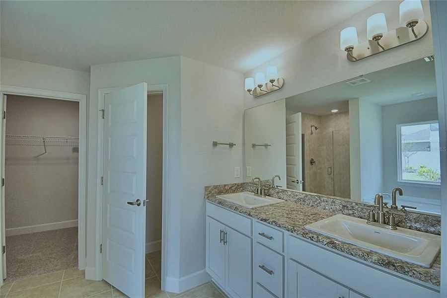 Furnished interior view inside a new home in Cadence Crossing, Auburndale (Image 13).