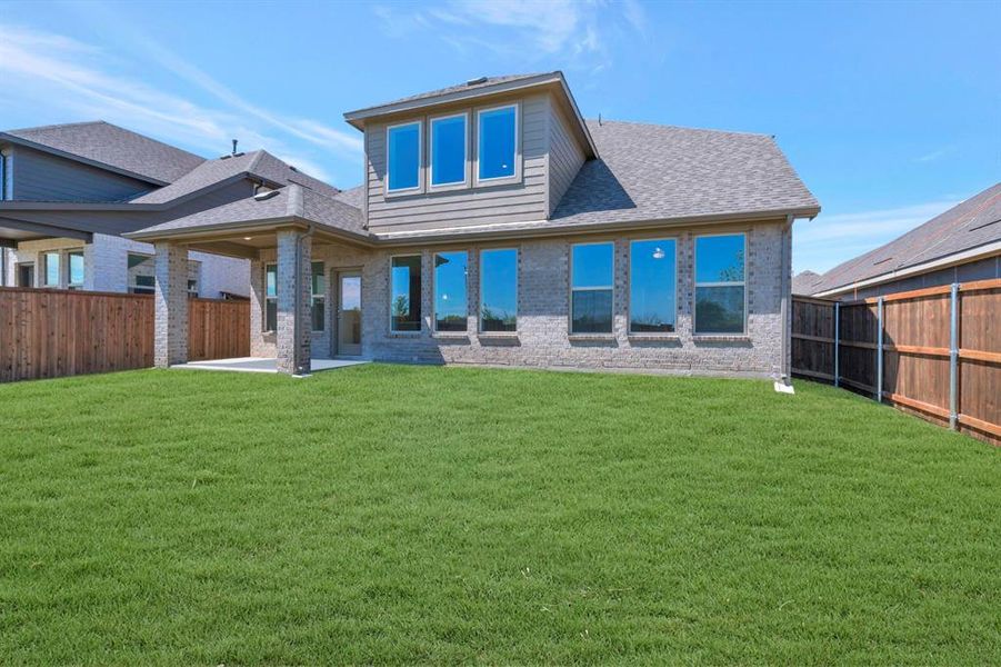 Exterior details and patio area of a home in Vintage Village, Argyle (Image 21).