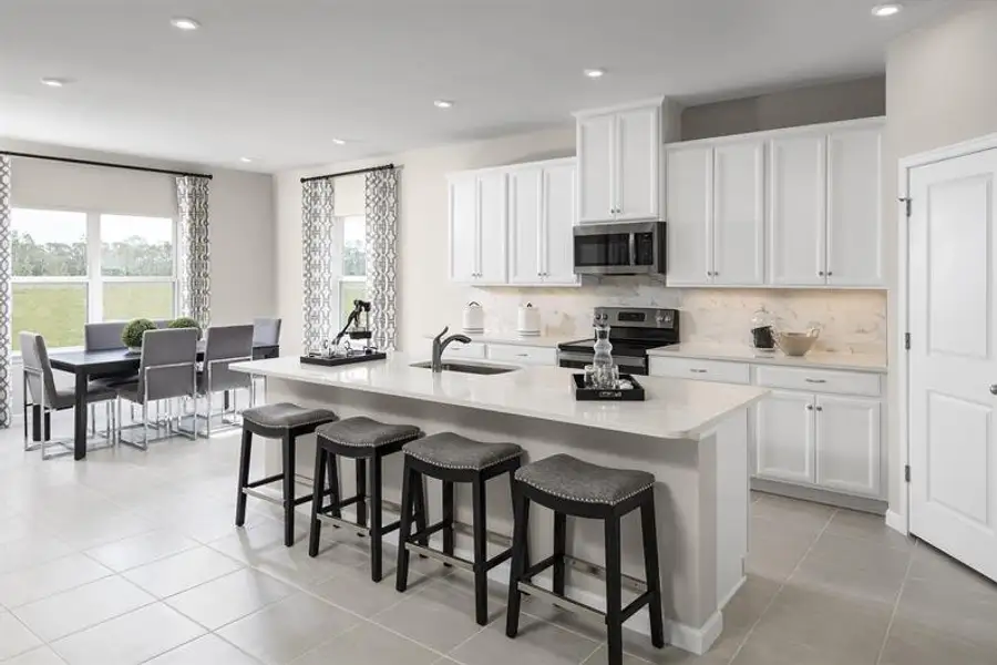 Representative furnished interior of a home built from the Sandalwood by Ryan Homes in Bellaviva, Auburndale (Image 6).