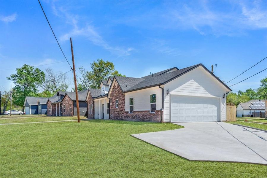 Front exterior of a new home in , Sulphur Springs, TX, highlighting curb appeal (Image 22).