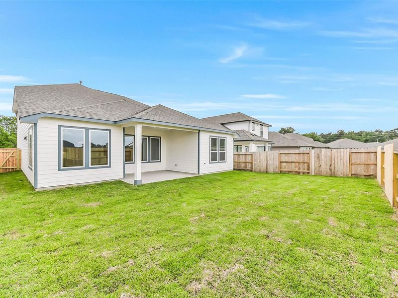 Exterior details and patio area of a home in Sundance Cove, Crosby (Image 29).