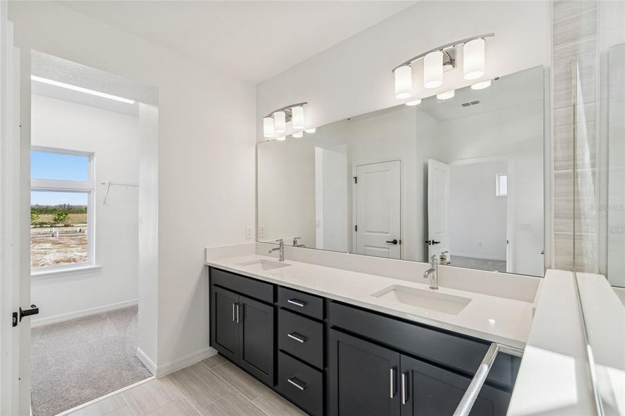 Furnished interior view inside a new home in Weslyn Park in Sunbridge 34', St. Cloud (Image 18).