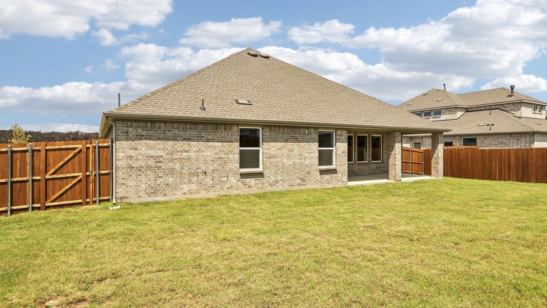 Exterior details and patio area of a home in Silverado, Aubrey (Image 3).
