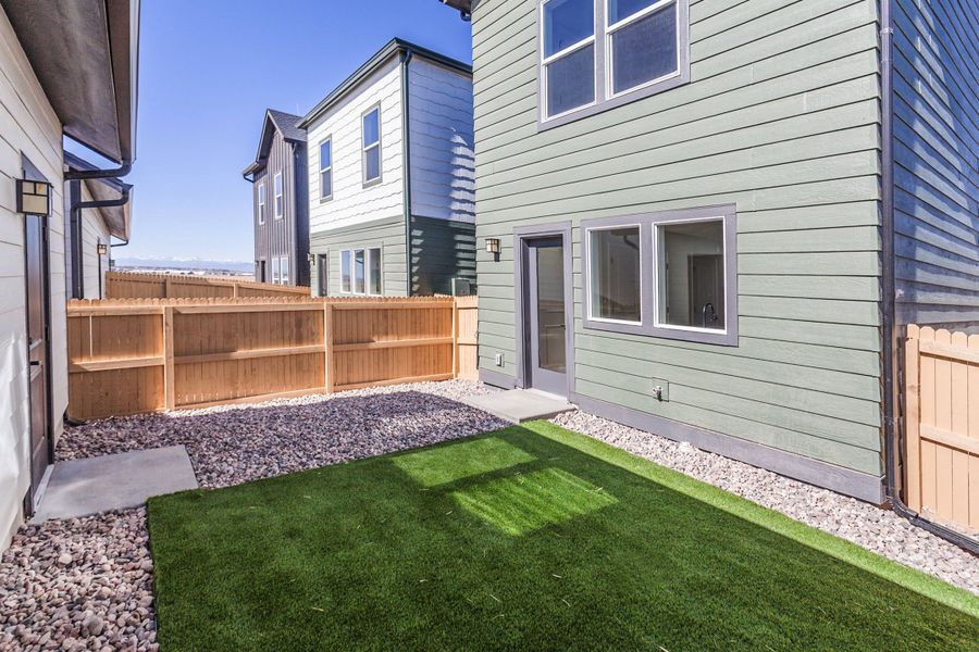 Exterior details and patio area of a home in Prairie Song, Windsor (Image 3). Exterior details and patio area of a home in Prairie Song, Windsor (Image 3).