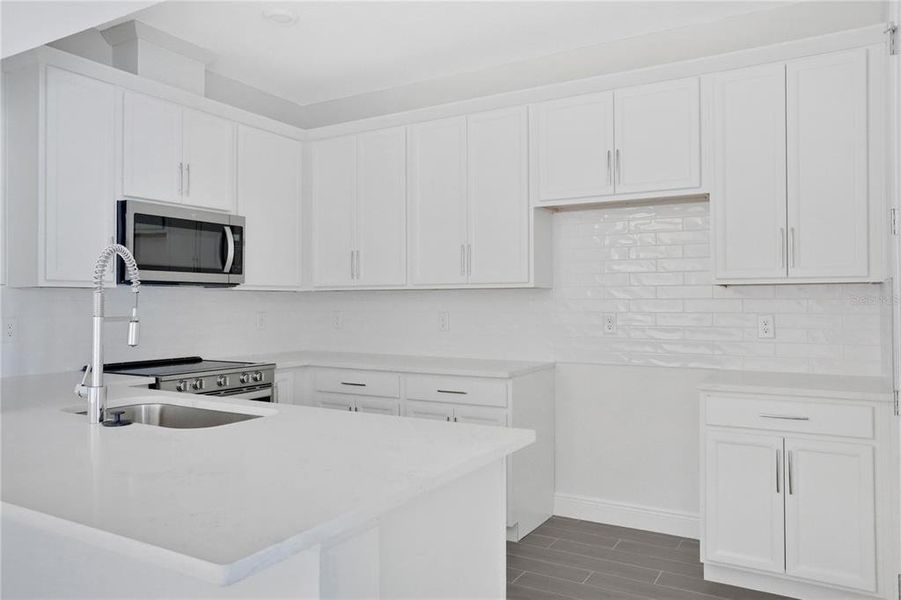 Furnished interior view inside a new home in Seaire, Parrish (Image 6).