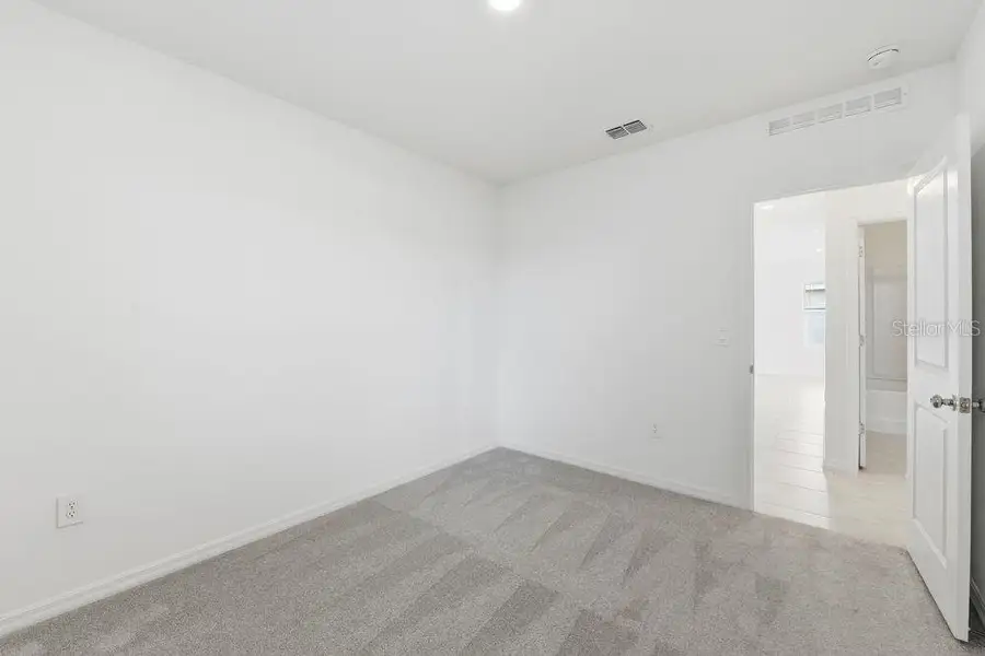 Spacious, unfurnished interior of a new home in Firethorn, Parrish (Image 23).