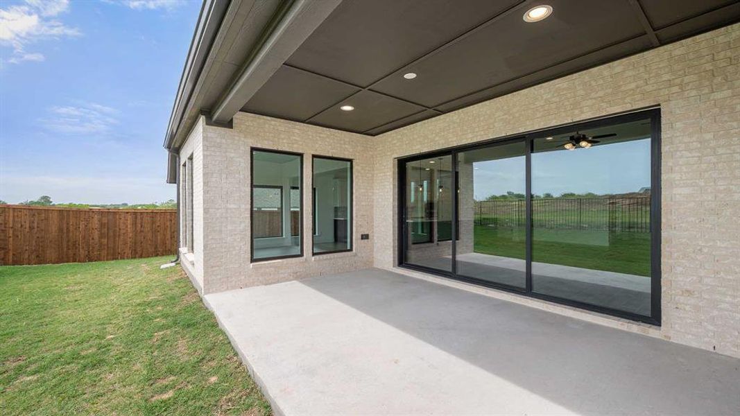 Exterior details and patio area of a home in Sweetgrass, Haslet (Image 2). Exterior details and patio area of a home in Sweetgrass, Haslet (Image 2).