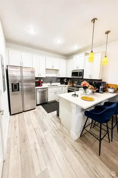 Furnished interior view inside a new home in , Poinciana (Image 6).