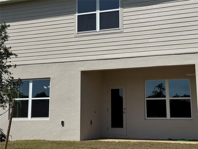 Front exterior of a new home in Harmony Central, Harmony, FL, highlighting curb appeal (Image 18). Front exterior of a new home in Harmony Central, Harmony, FL, highlighting curb appeal (Image 18).