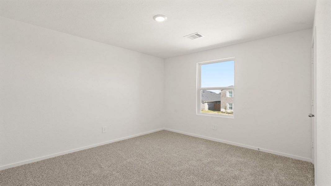 Spacious, unfurnished interior of a new home in Sunterra, Katy (Image 20).