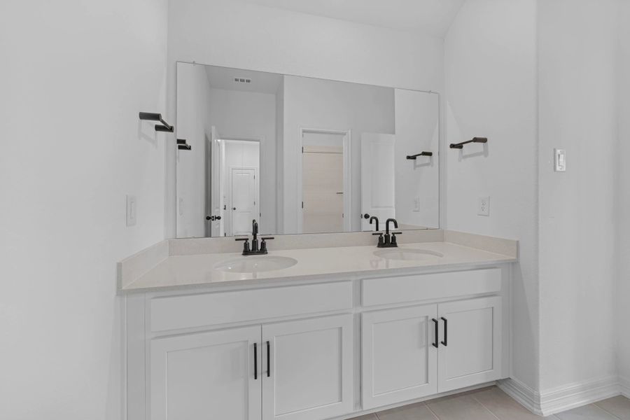Second bath. Note: Sample product photo. Actual exterior and interior selections may vary by homesite. Photo may be virtually staged