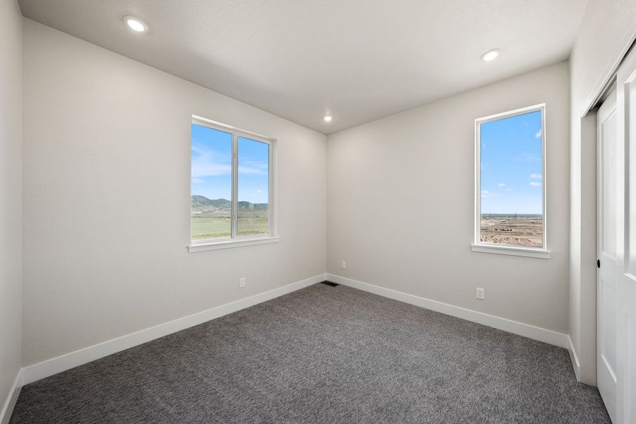 Spacious, unfurnished interior of a new home in Trumark Homes at Sterling Ranch, Littleton (Image 31).