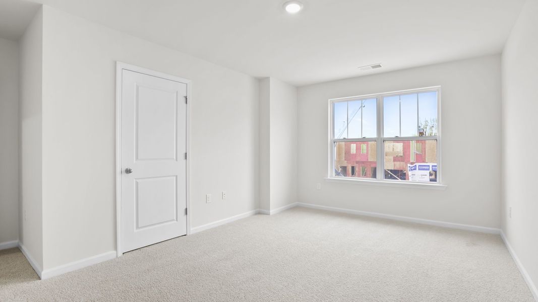 Spacious, unfurnished interior of a new home in Chestnut Ridge Townhomes, Greenville (Image 27).