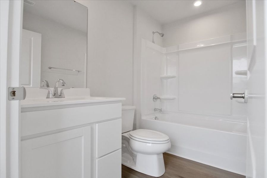 Furnished interior view inside a new home in Wren Woods 2-Story, Gray Court (Image 8).