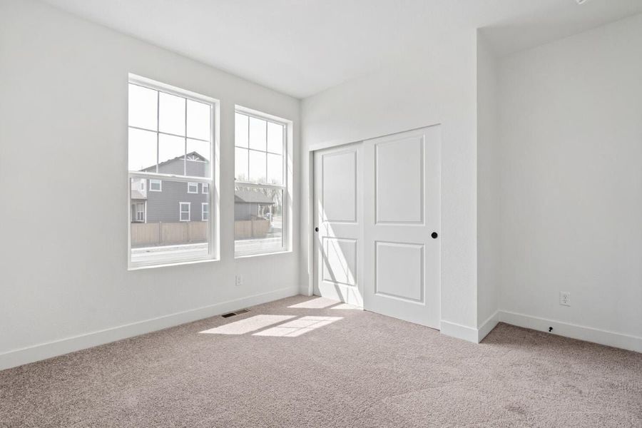 Spacious, unfurnished interior of a new home in The Nest Reserve at Canyon Creek, Erie (Image 16).