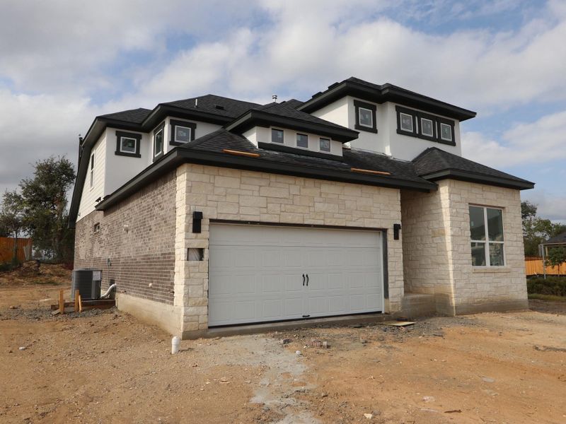 In-progress construction of a new home in Heritage, Dripping Springs, TX (Image 5). In-progress construction of a new home in Heritage, Dripping Springs, TX (Image 5).
