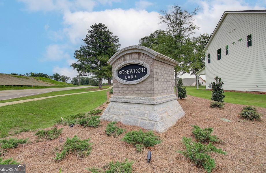 Front exterior of a new home in Rosewood Lake Estates, Hoschton, GA, highlighting curb appeal (Image 23).