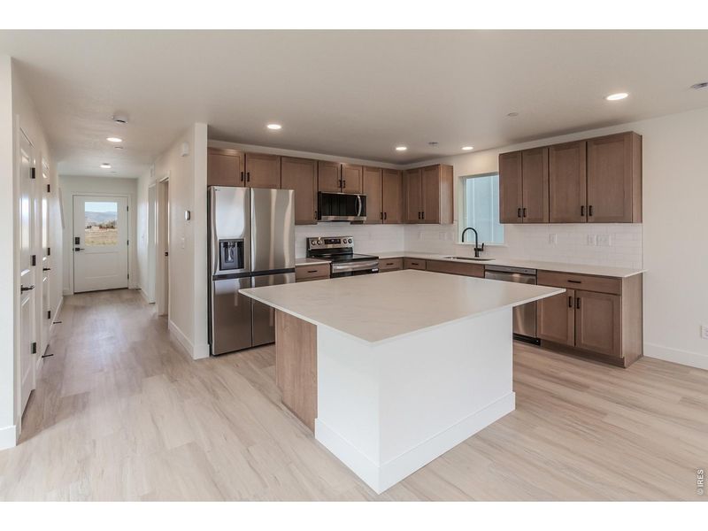 Furnished interior view inside a new home in Bloom Trailblazer Collection - Single Family Homes, Fort Collins (Image 7).