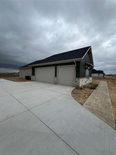 View of home's exterior featuring a garage