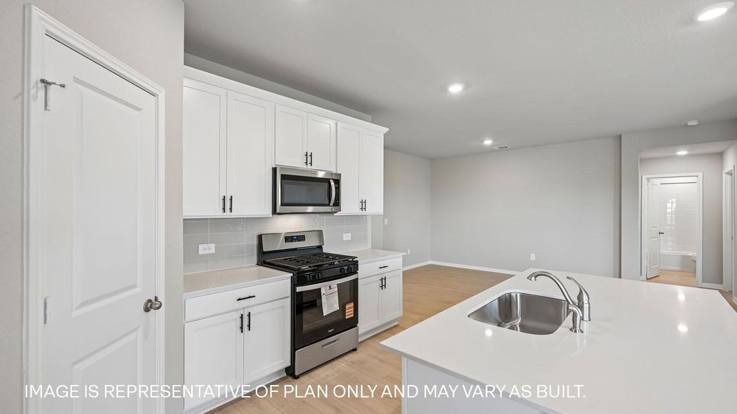 Furnished interior view inside a new home in Carillon, Manor (Image 9).