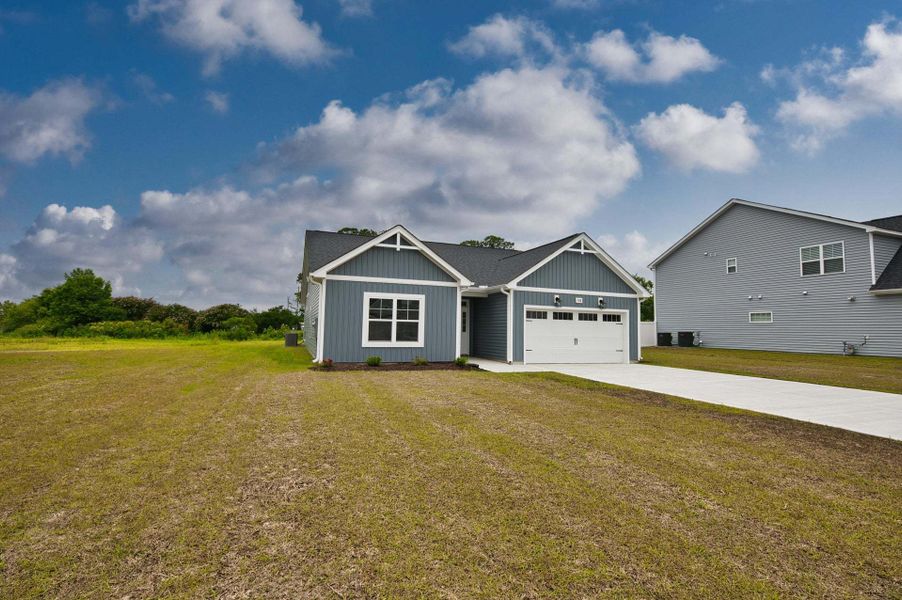 Representative exterior photo of a completed home built from the Dogwood by Caviness & Cates Communities in Maggie Way, Wendell, NC (Image 71).
