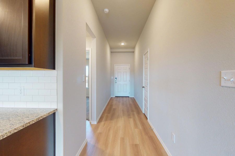 Spacious, unfurnished interior of a new home in Carillon, Manor (Image 27).