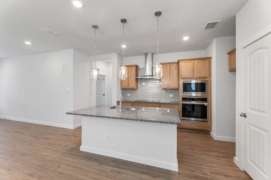 Furnished interior view inside a new home in Highland Ridge, New Braunfels (Image 11).