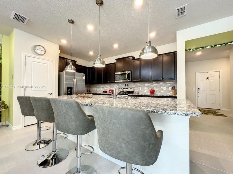 Furnished interior view inside a new home in , Davenport (Image 3).