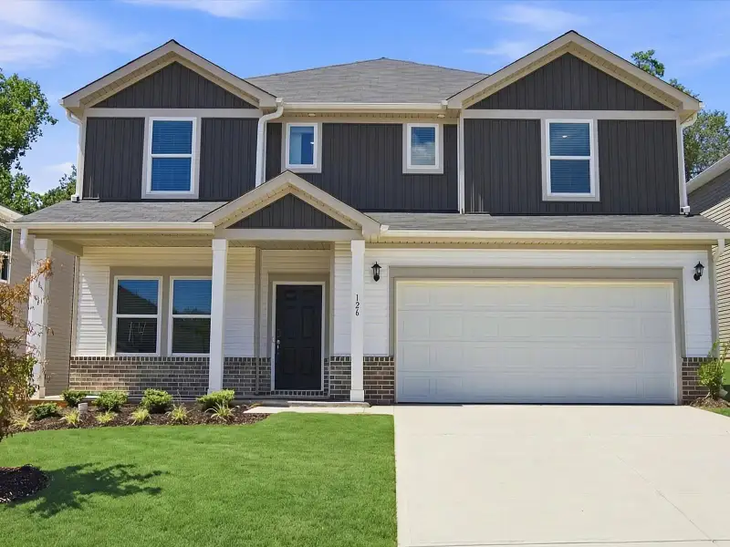 Front exterior of a new home in Shiloh Valley, Piedmont, SC, highlighting curb appeal (Image 1). Front exterior of a new home in Shiloh Valley, Piedmont, SC, highlighting curb appeal (Image 1).