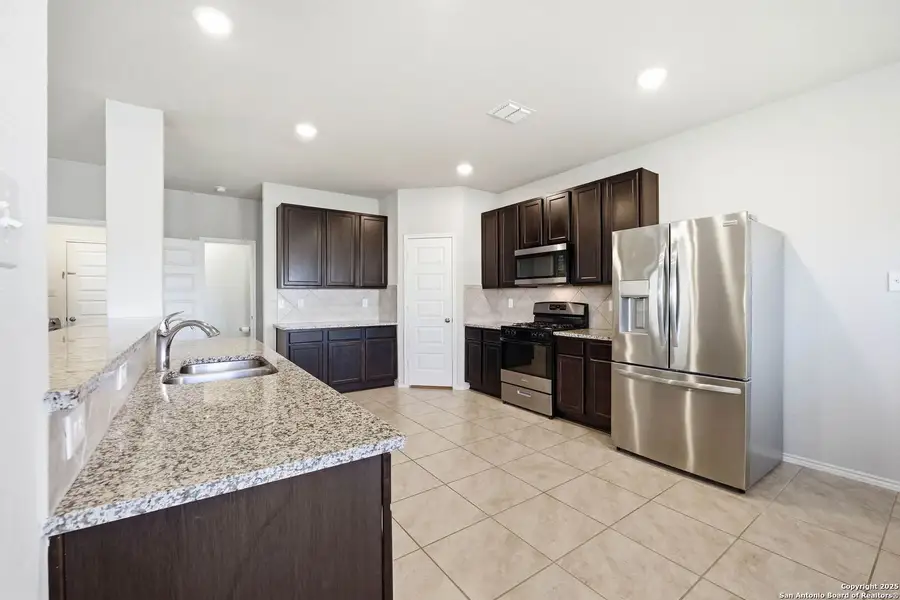 Furnished interior view inside a new home in Abbott Place, St. Hedwig (Image 19).