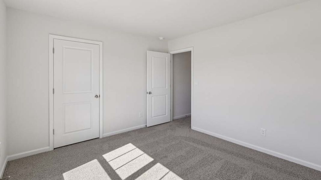 Spacious, unfurnished interior of a new home in Rydele Heights, Asheville (Image 42).