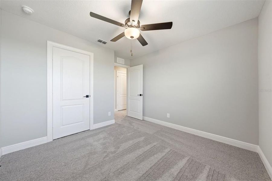 Spacious, unfurnished interior of a new home in Gum Lake Preserve, Lake Alfred (Image 51).