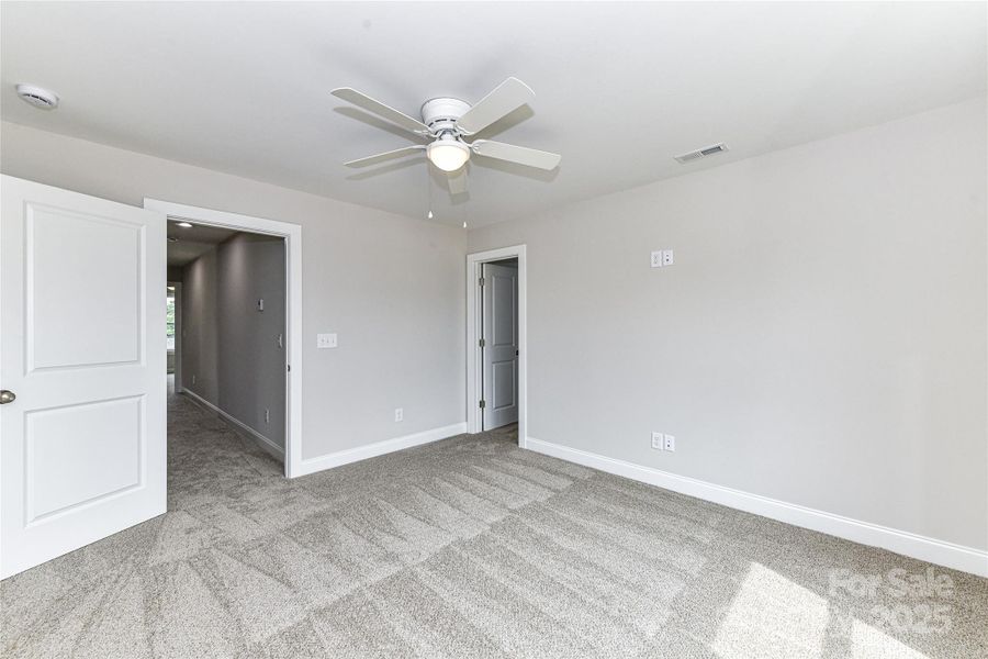 Secondary Bedroom on upper level with ceiling fan/light! Secondary Bedroom on upper level with ceiling fan/light!
