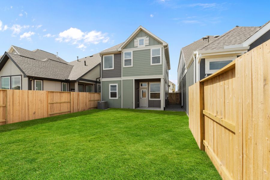Exterior details and patio area of a home in Bridgeland, Cypress (Image 23).