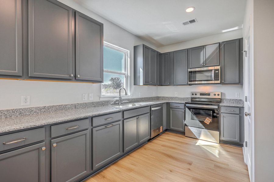 Furnished interior view inside a new home in , Holly Hill (Image 7).